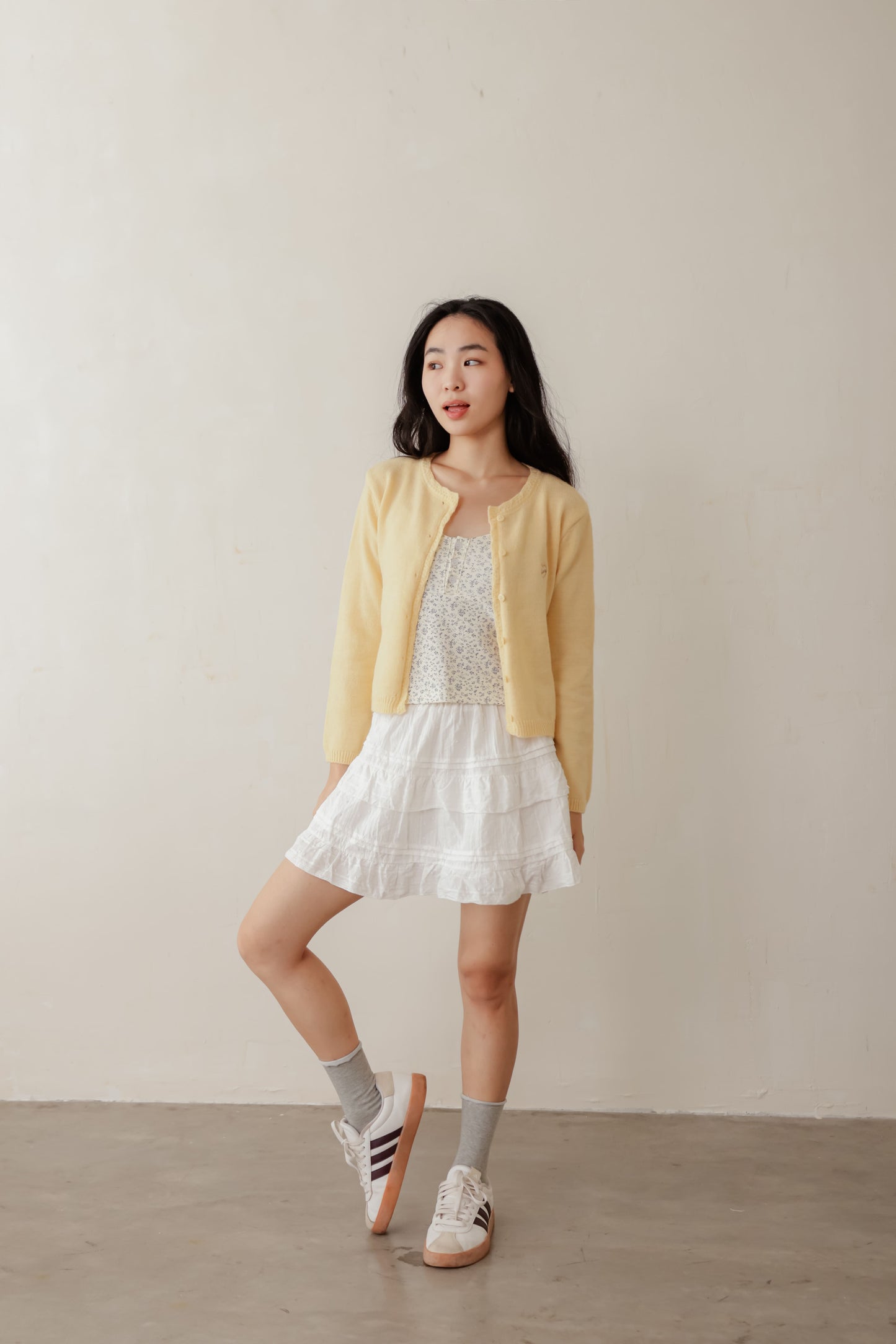 Yellow Candy cardigan with soft knit texture and contrast buttons – playful layering piece for everyday wear