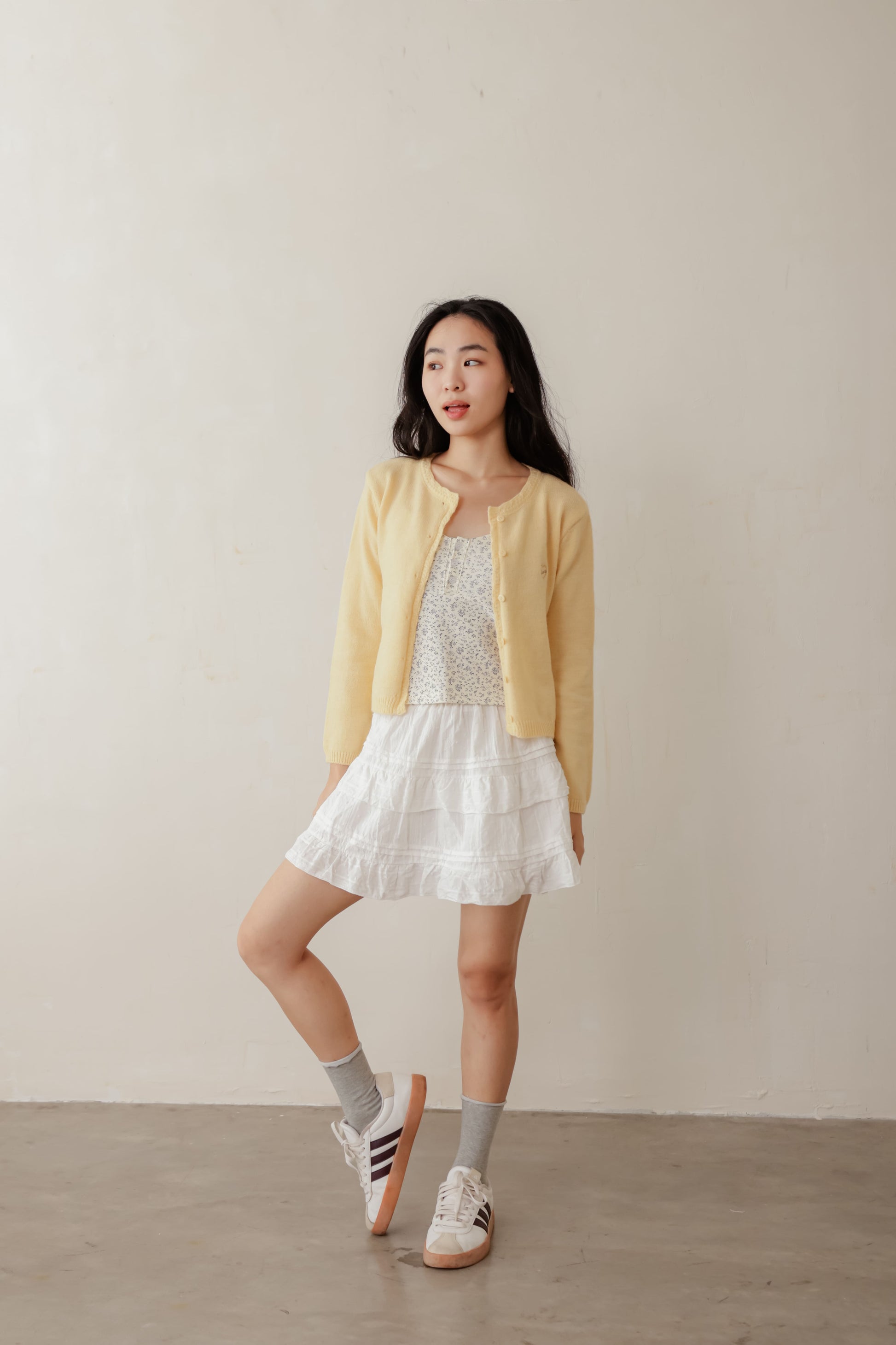 Yellow Candy cardigan with soft knit texture and contrast buttons – playful layering piece for everyday wear