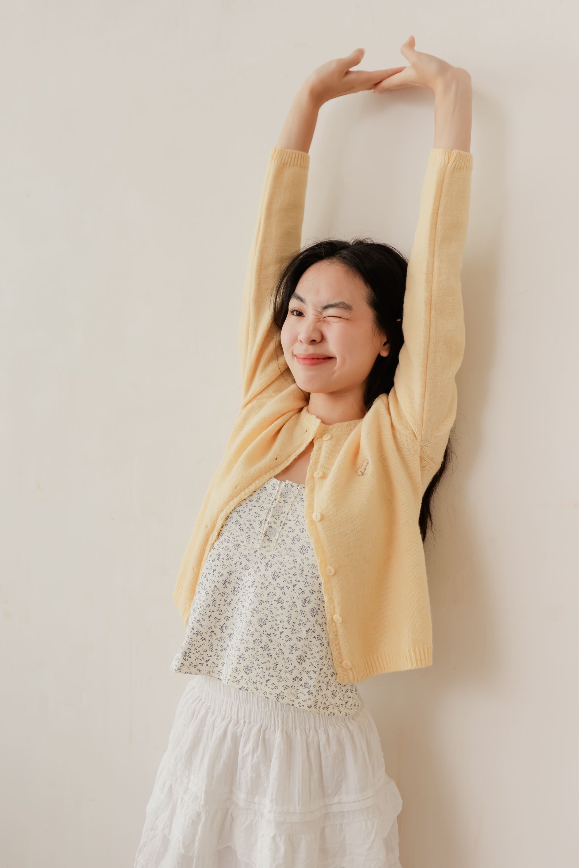 Yellow Candy cardigan with soft knit texture and contrast buttons – playful layering piece for everyday wear
