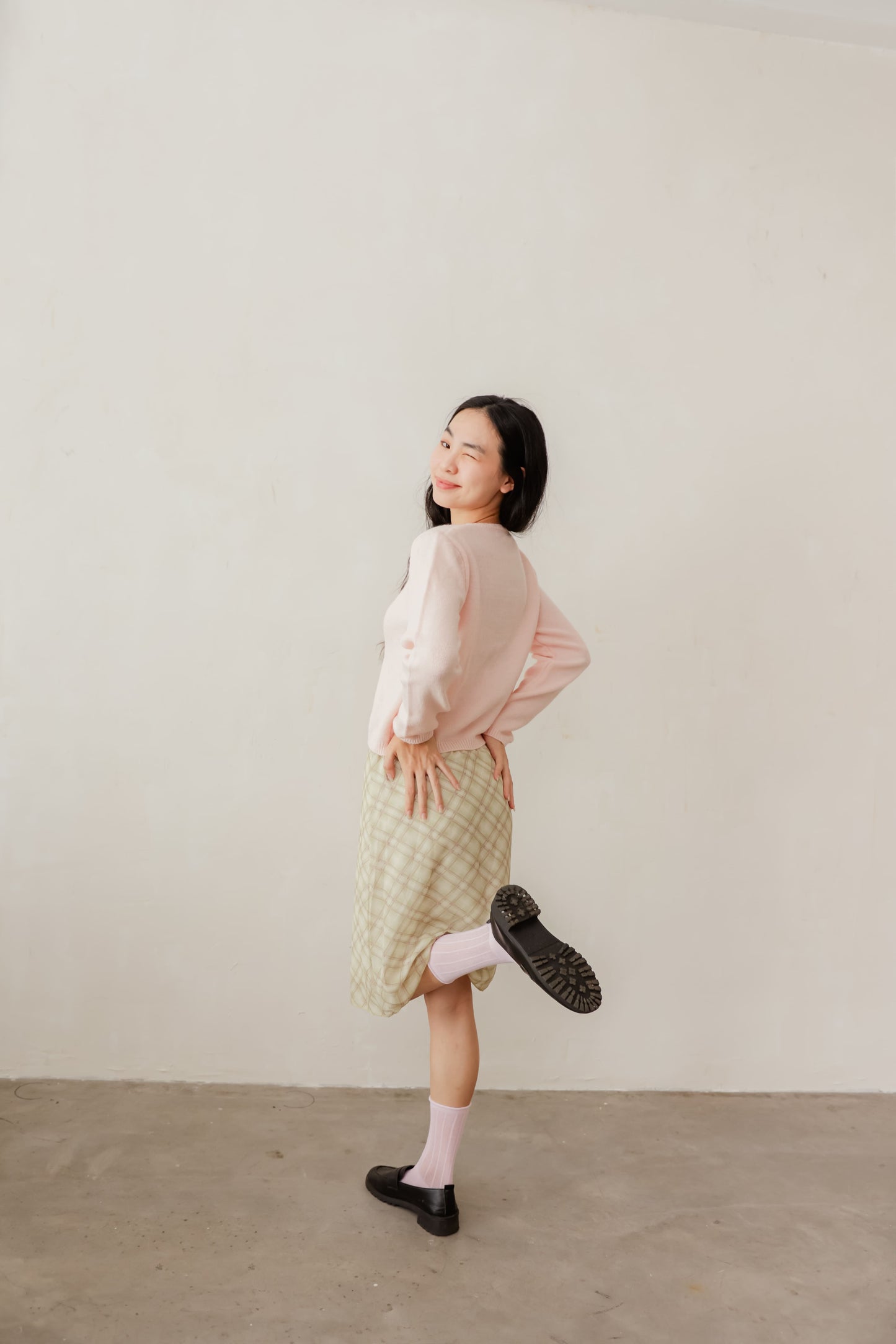 Pink Candy cardigan with soft knit texture and contrast buttons – playful layering piece for everyday wear