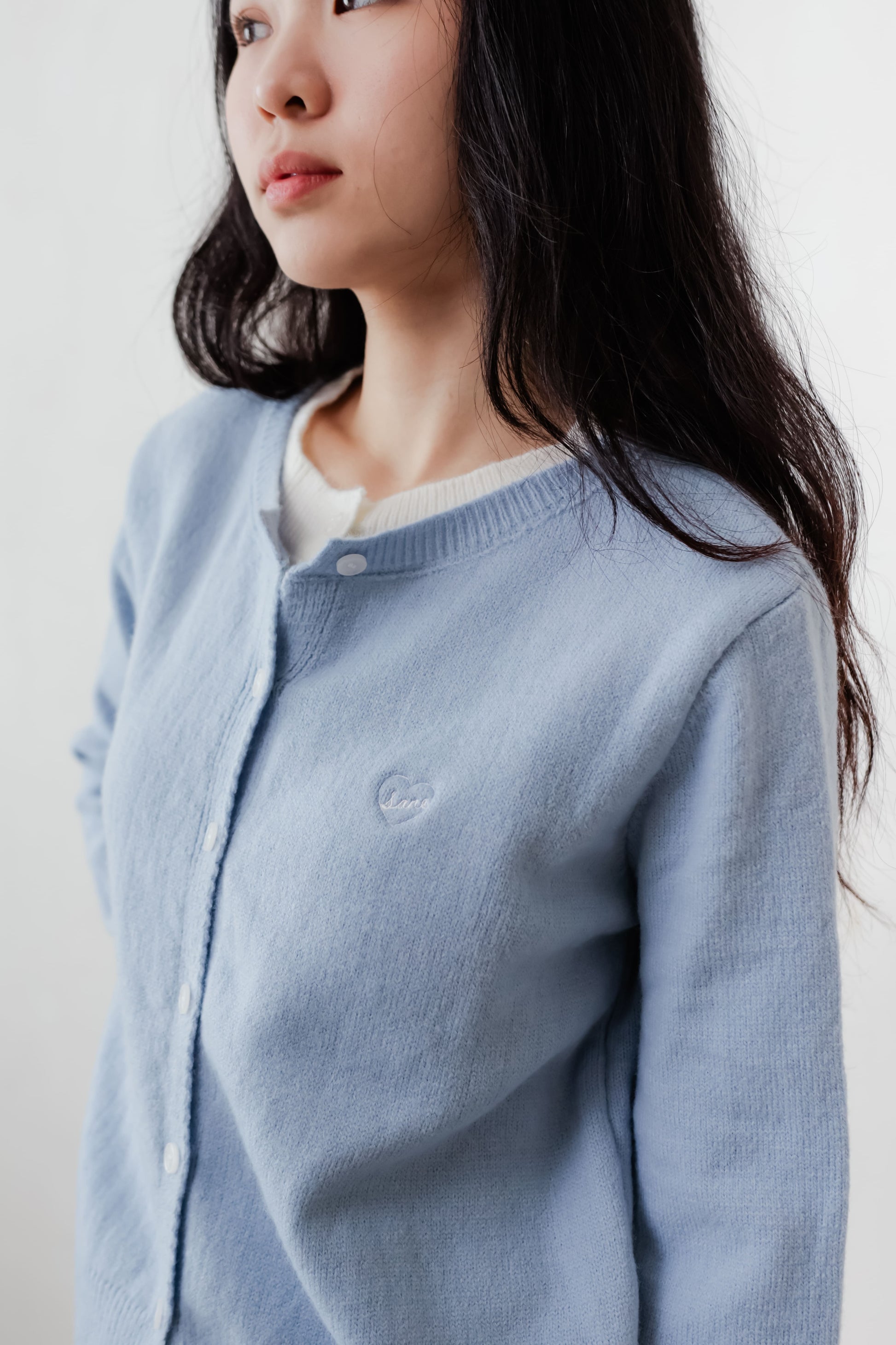 Blue and white Duet cardigan with layered two-in-one look – relaxed fit with contrast inner panel detail