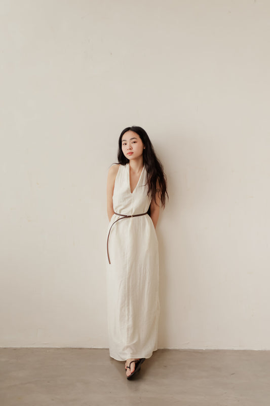 Cream Lune maxi dress with flowy silhouette and subtle pleats – effortless one-piece for everyday wear